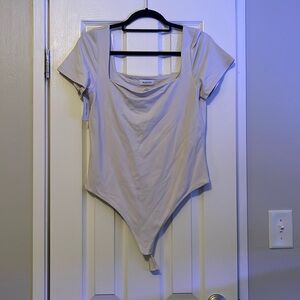 Cream color body suit